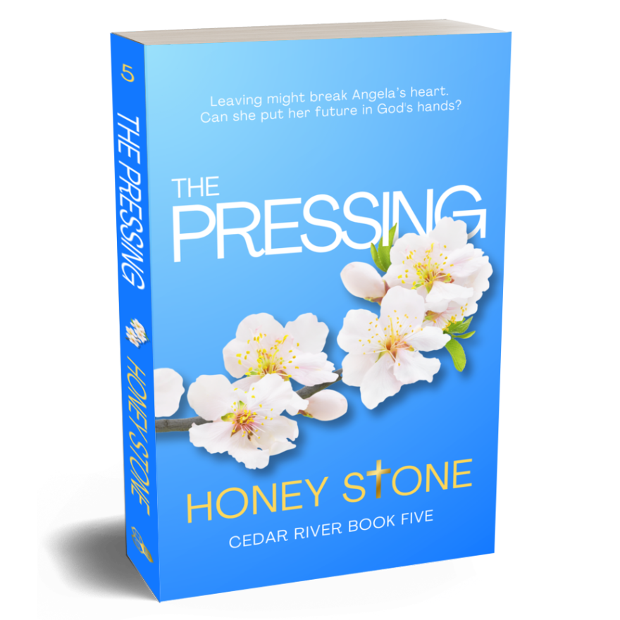 Book Five in the sweet & clean Christian fiction Cedar River series, The Pressing. A blue cover with a branch of five pale pink apple blossoms.